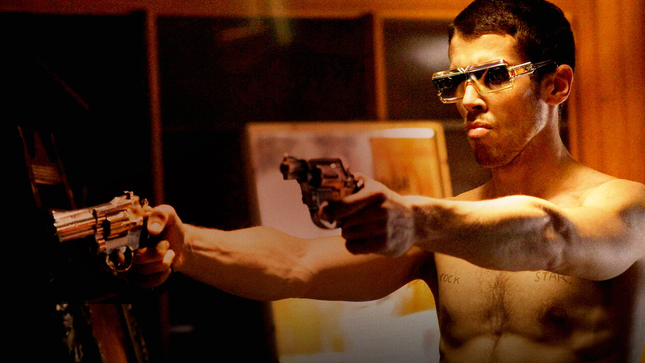 Archie Slap Watch this clip from RocknRolla